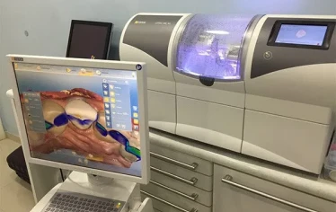 Advanced dental CAD/CAM milling machines used for same-day crowns.
