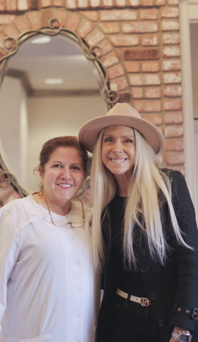 Smiling woman during a dental checkup at a modern San Diego dental clinic