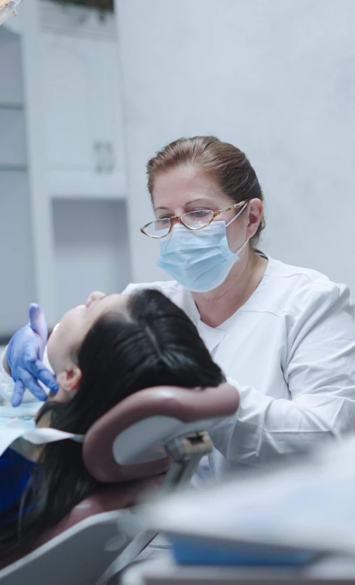 Patient receiving professional teeth whitening at My Smile Clinic in San Diego. Modern equipment and expert supervision.